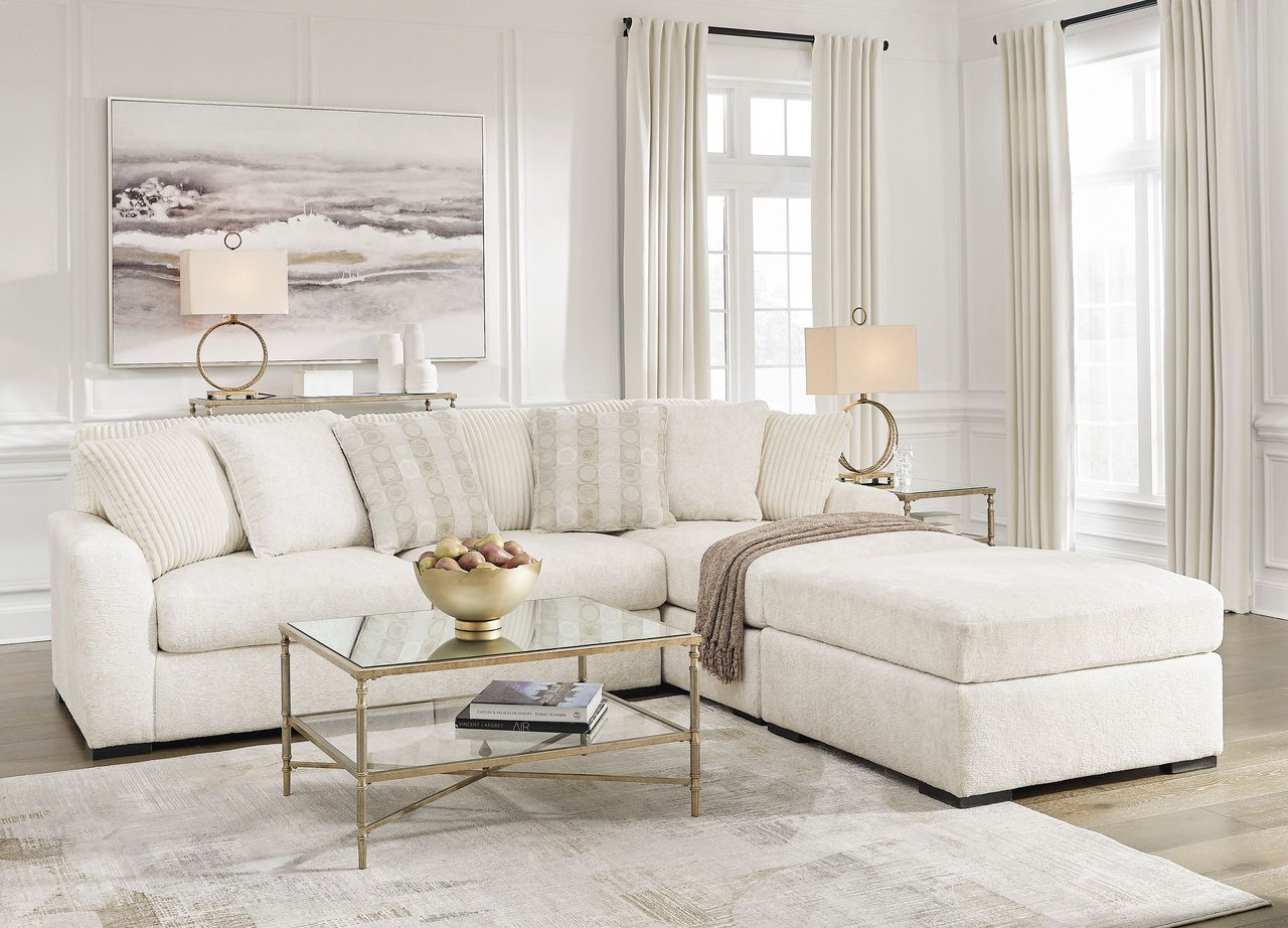 Chessington 2-Piece Sectional and Ottoman In Ivory 61904U2