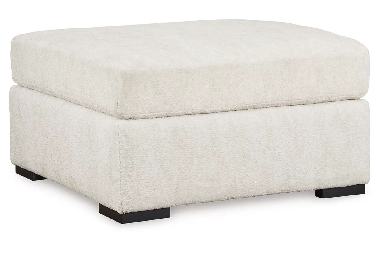Chessington 2-Piece Sectional and Ottoman In Ivory 61904U2