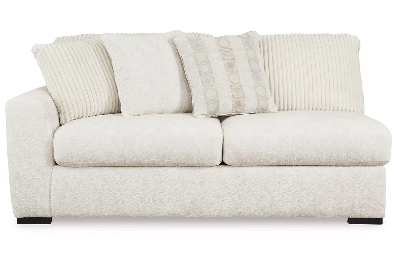 Chessington 2-Piece Sectional and Ottoman In Ivory 61904U2