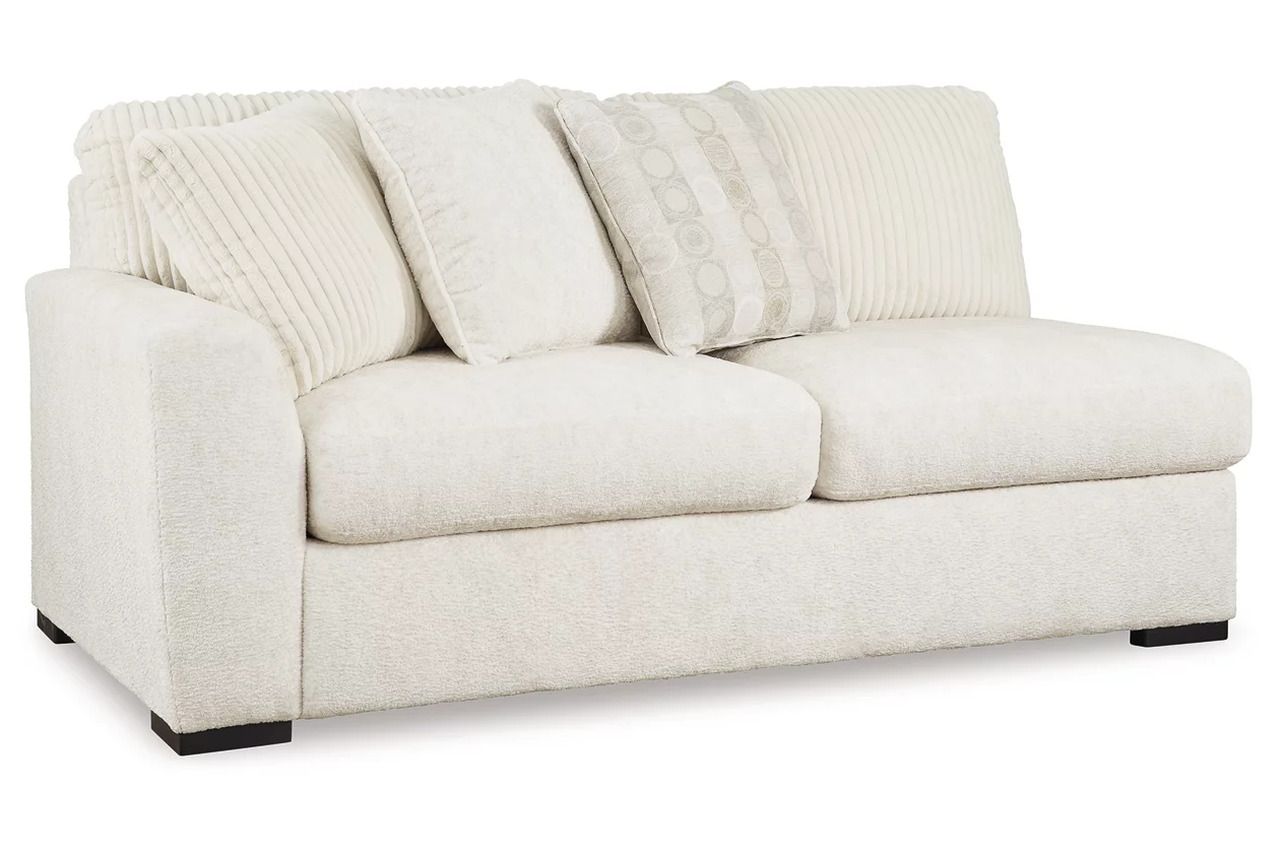 Chessington 2-Piece Sectional and Ottoman In Ivory 61904U2