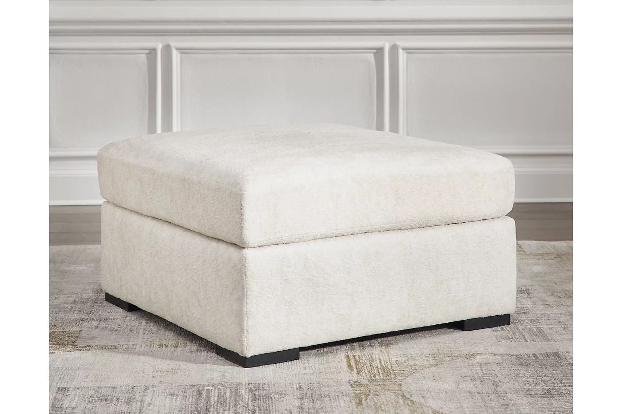 Chessington 2-Piece Sectional and Ottoman In Ivory 61904U2
