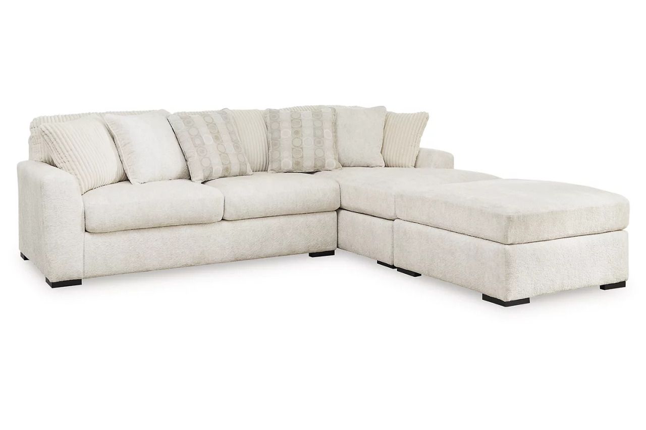Chessington 2-Piece Sectional and Ottoman In Ivory 61904U2
