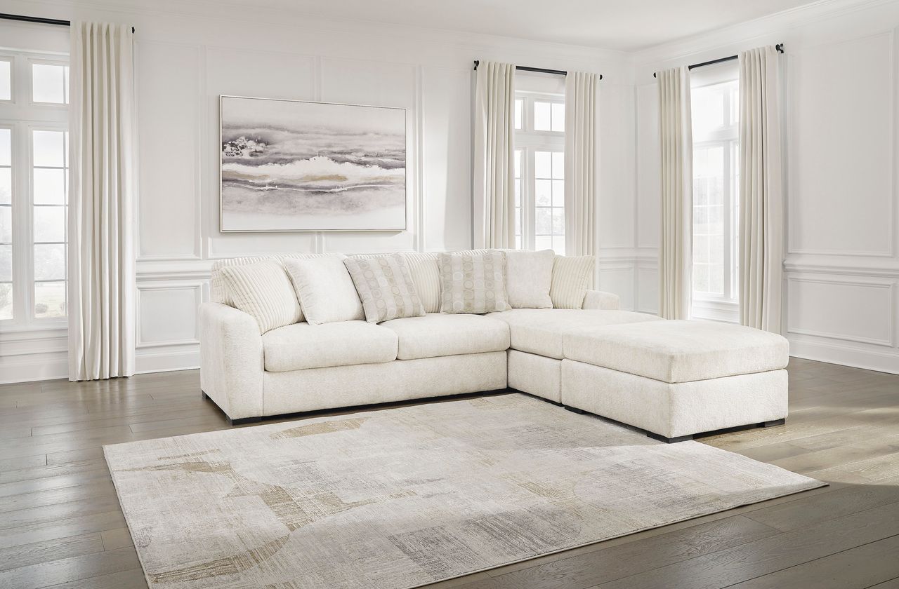 Chessington 2-Piece Sectional and Ottoman In Ivory 61904U2