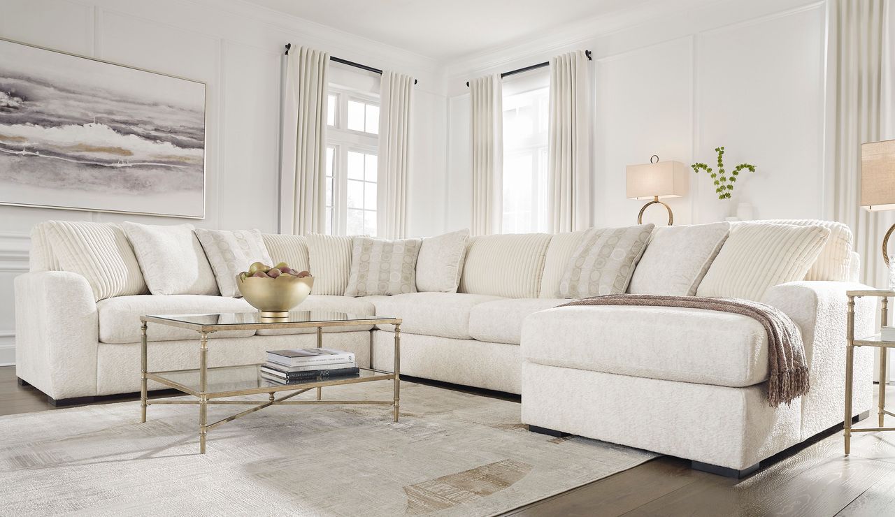 Chessington 2-Piece Sectional and Ottoman In Ivory 61904U2