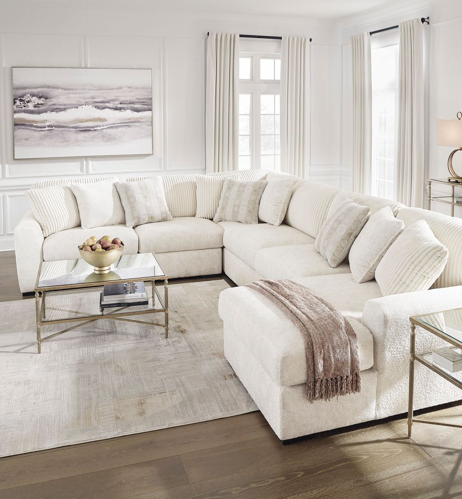 Chessington 2-Piece Sectional and Ottoman In Ivory 61904U2