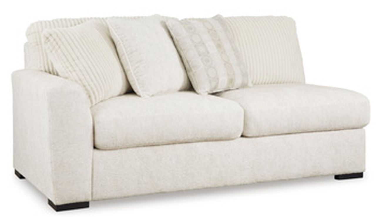 Chessington 2-Piece Sectional and Ottoman In Ivory 61904U2