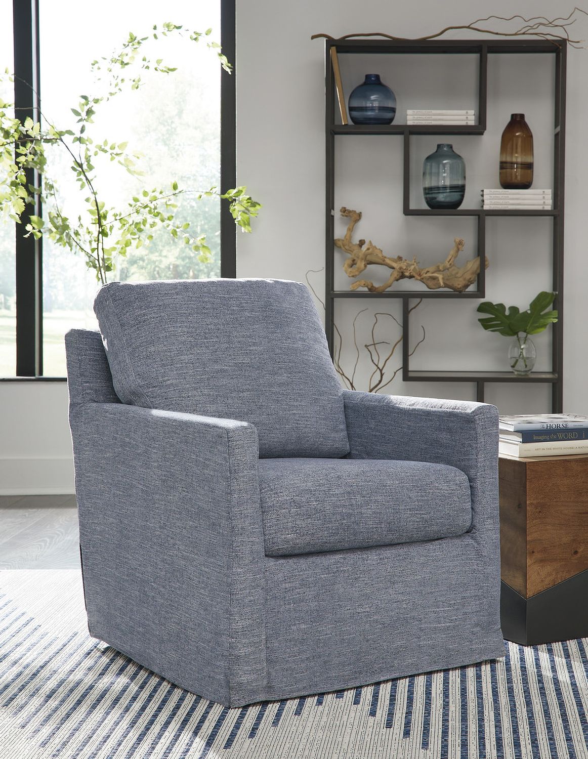 Nenana Next-Gen Nuvella Swivel Glider Accent Chair In Denim A3000646