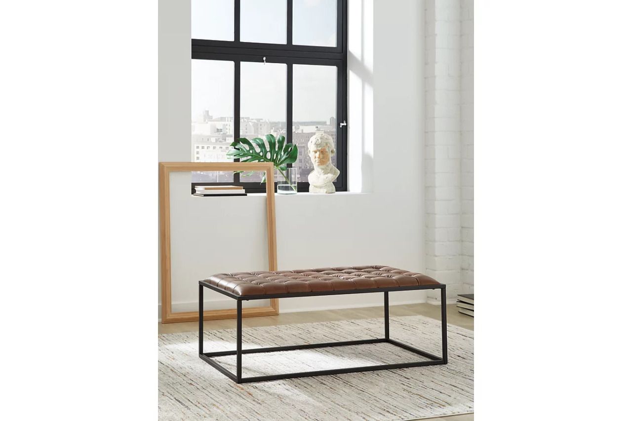 Junsor Coffee Table Ottoman In Brown and Black A3000826