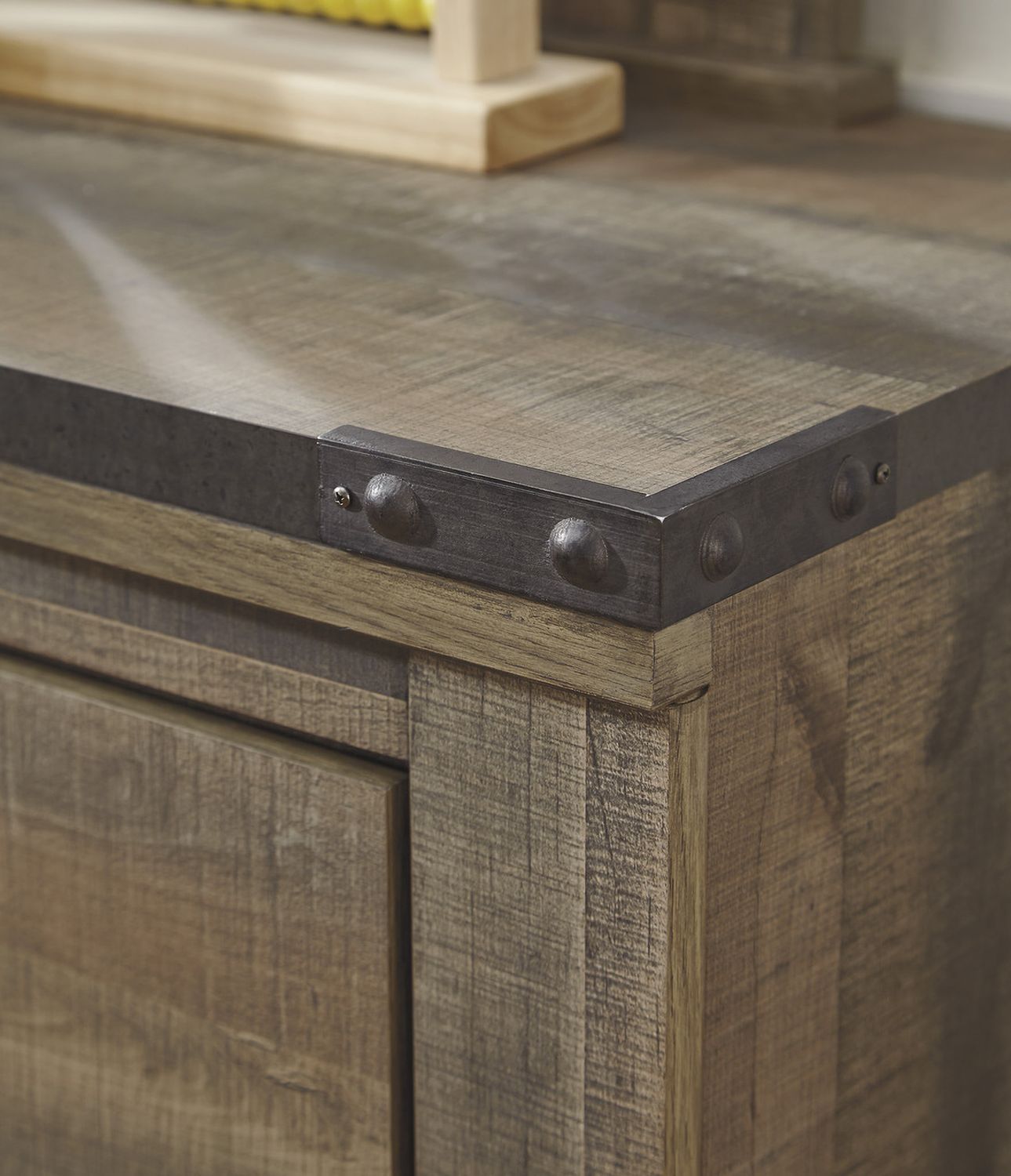 Trinell Brown Five Drawer Chest B44646