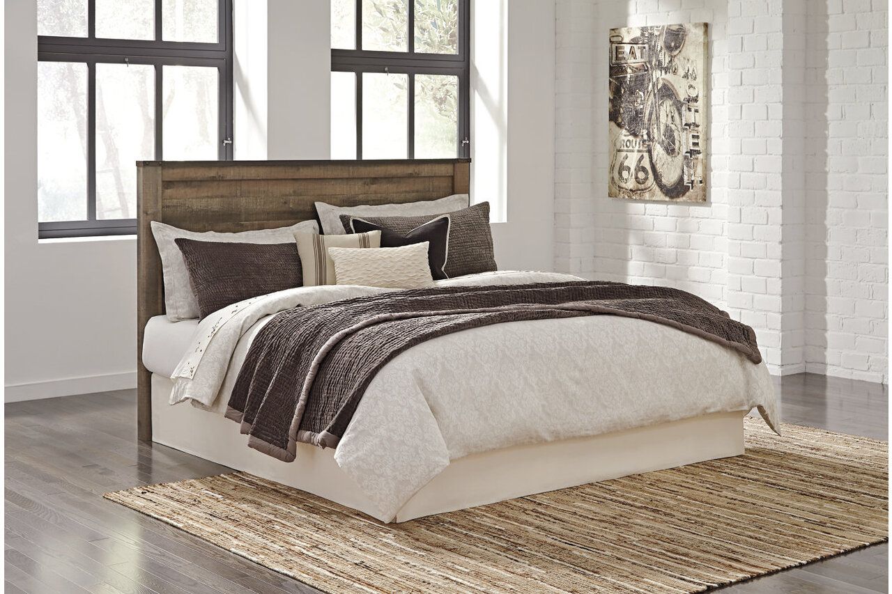 Trinell Brown King Panel Bed B446B23