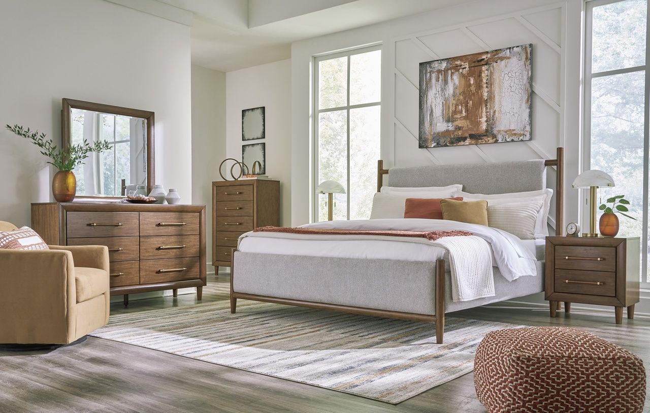 Lyncott Queen Upholstered Panel Bed In Brown B615B2
