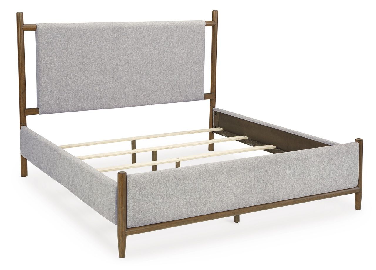 Lyncott Queen Upholstered Panel Bed In Brown B615B2
