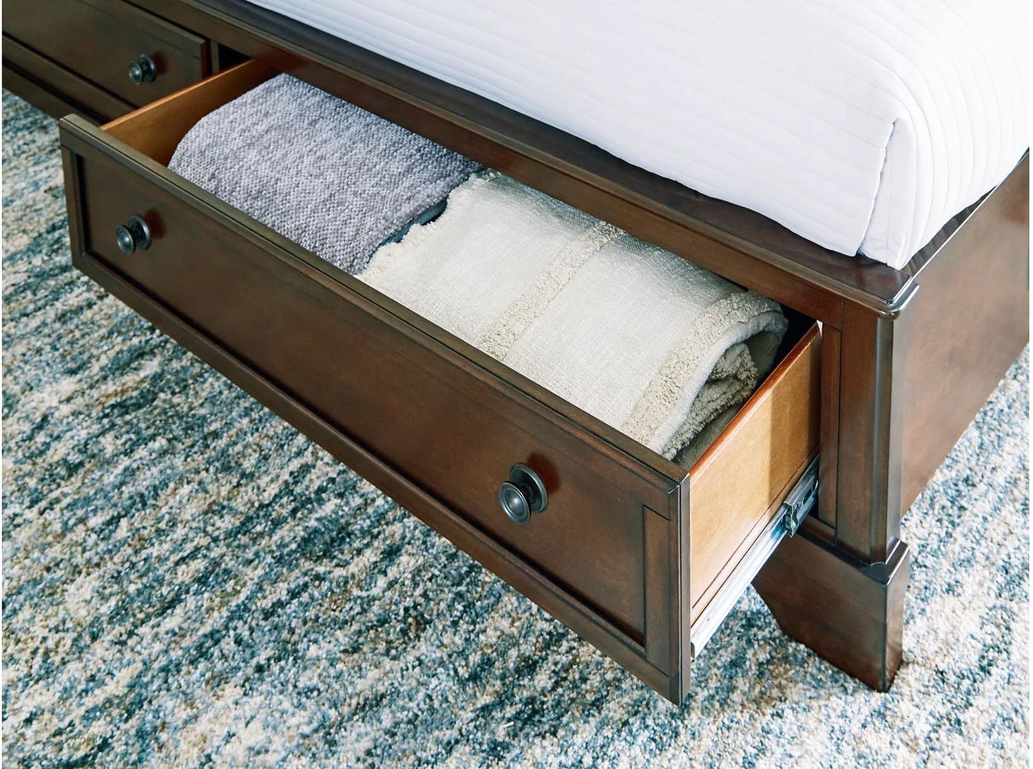 Trellington Queen Sleigh Storage Bed In Brown B716B1