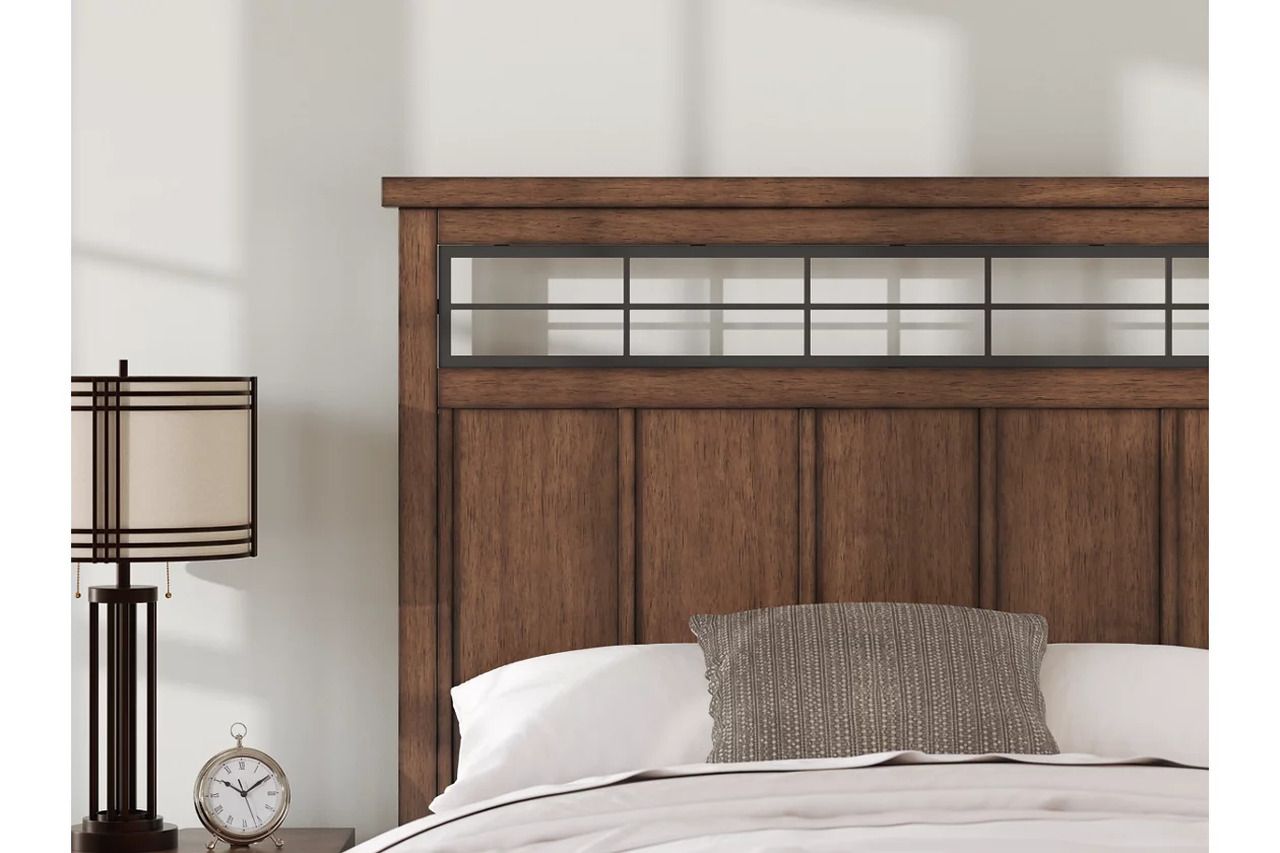 Taffenbrook Queen Panel Storage Bed In Medium Brown B849B2