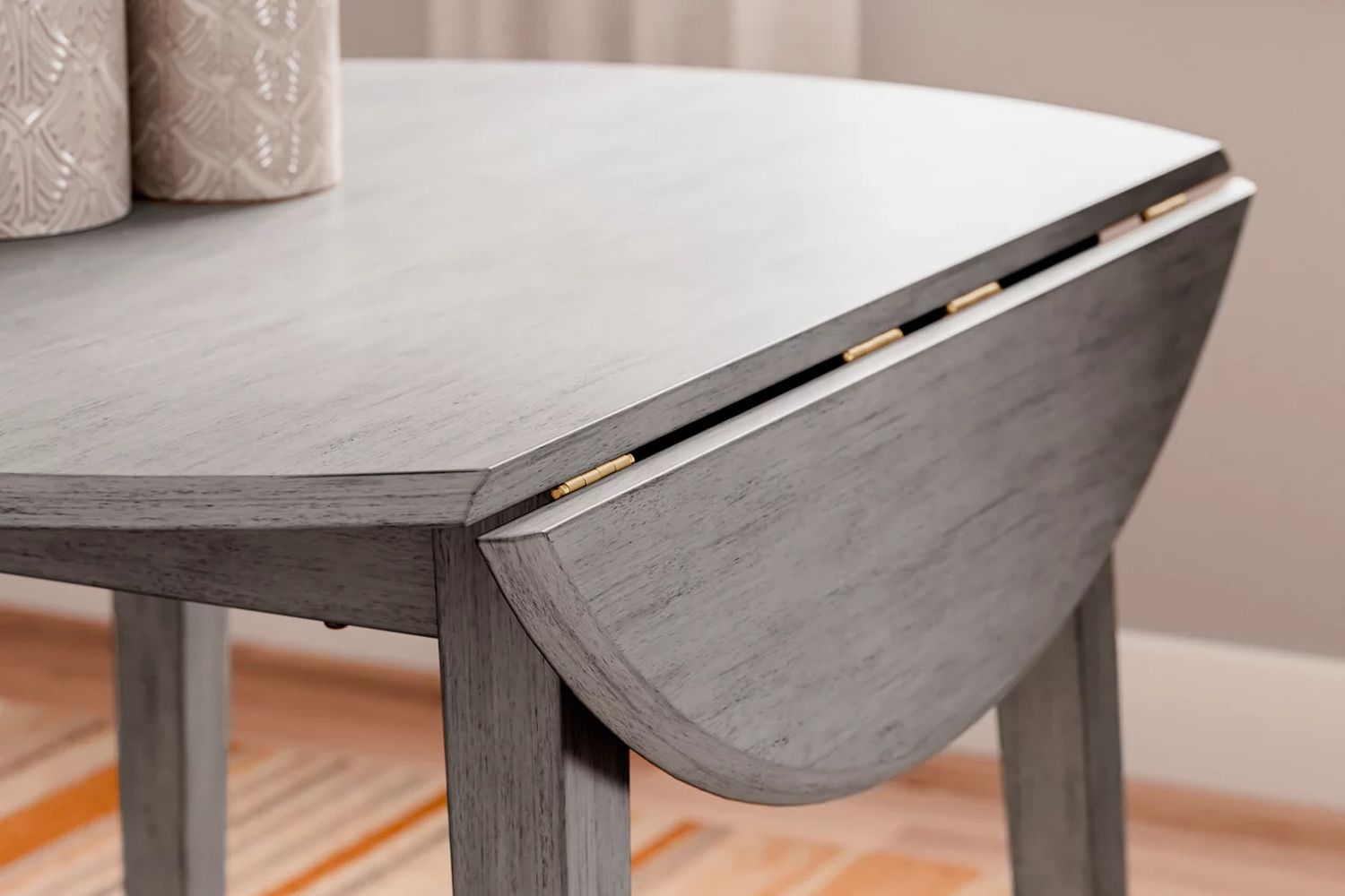 Shullden Gray Round Drop Leaf Table D19415