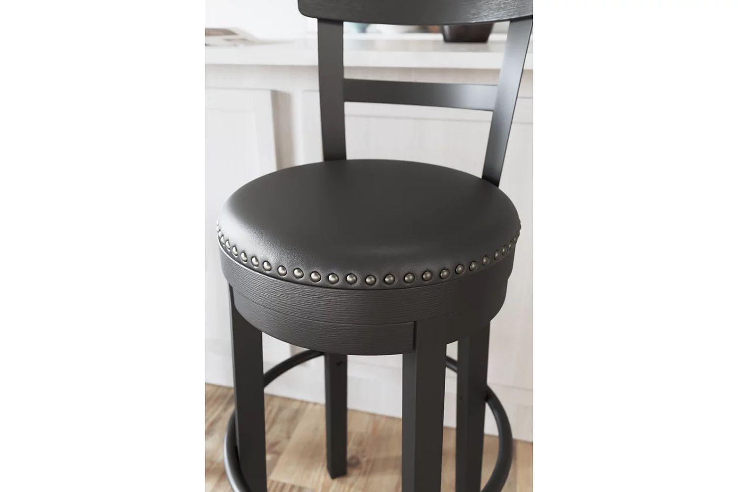 Valebeck Black Tall Upholstered Swivel Barstool D546630