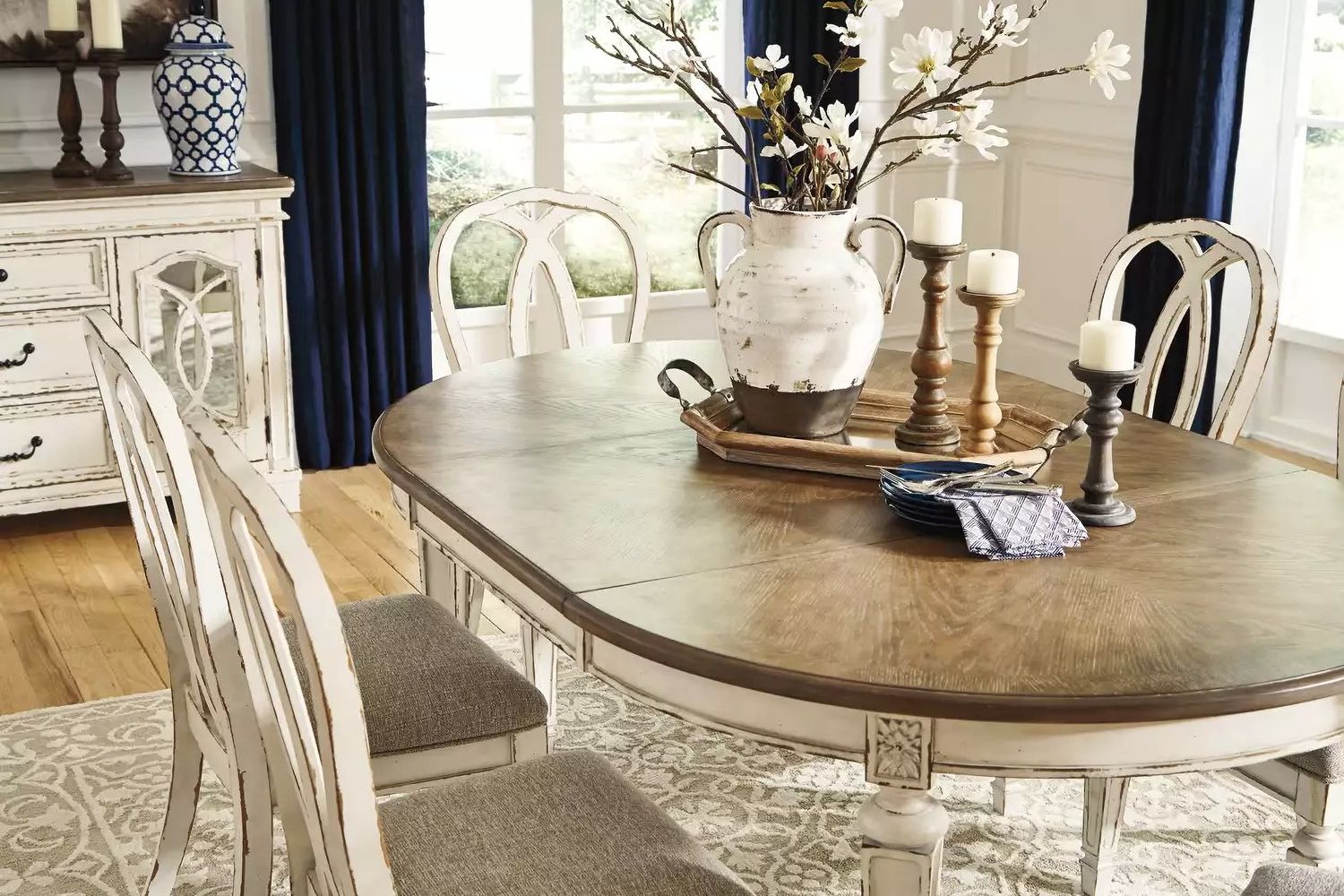 Realyn White Oval Extendable Dining Table D74335
