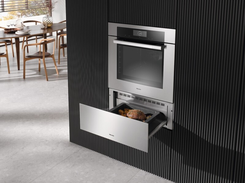 Handleless Gourmet warming drawer, 30‑" width and 10 13/16" height for preheating dishware, keeping food warm, and Slow Roasting. ESW7580