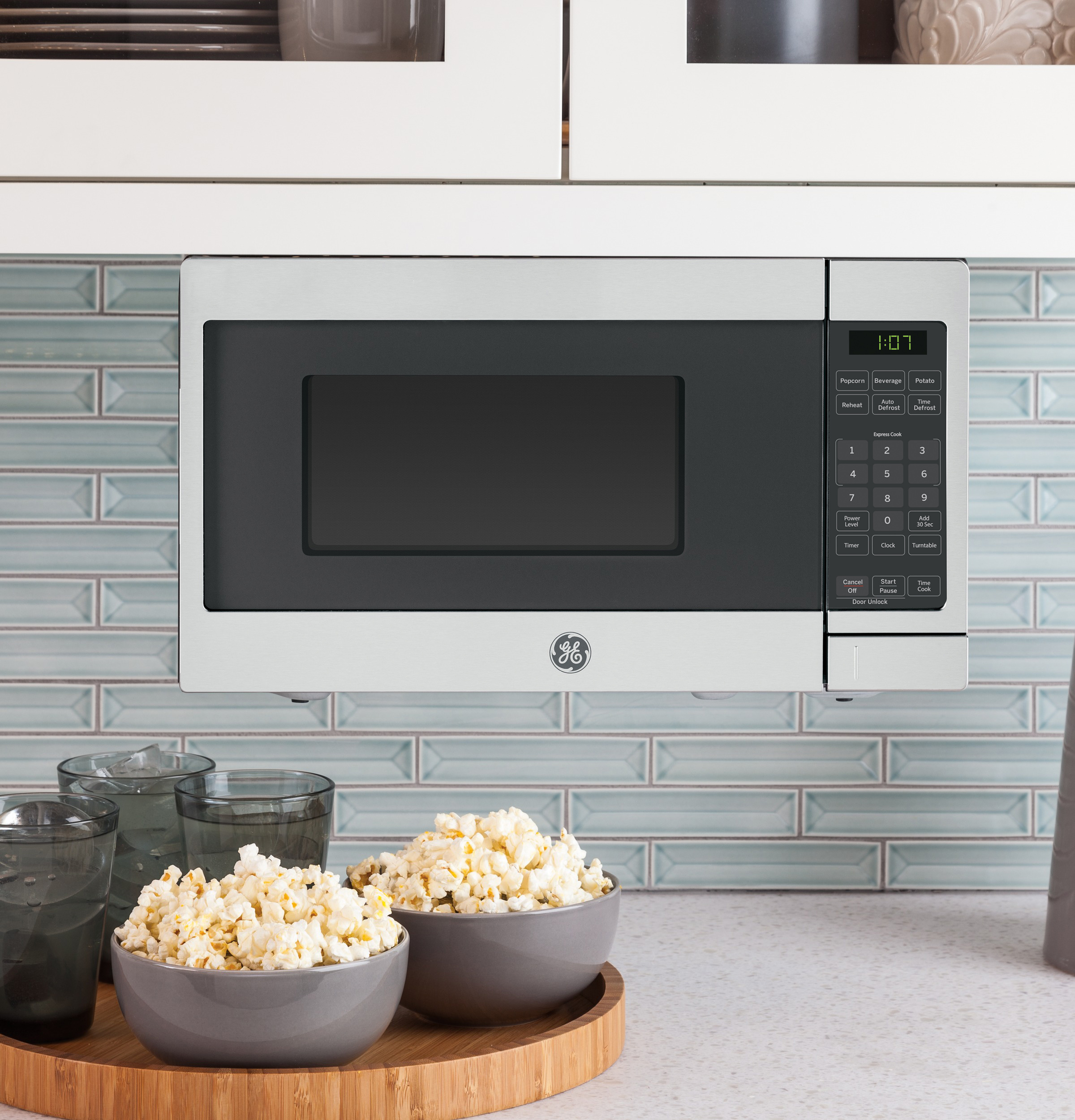 Buy GE Spacemaker Countertop Microwave Oven GCHK07N1WSS