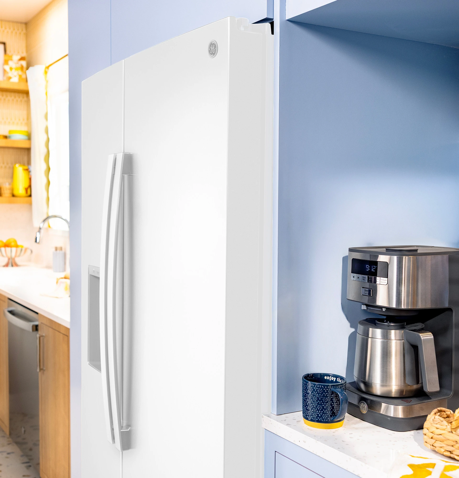 23.6 Cu. Ft. Counter-Depth Side-By-Side Refrigerator with Extra Tall Dispenser and In-Door Icemaker GZE24NGYWW