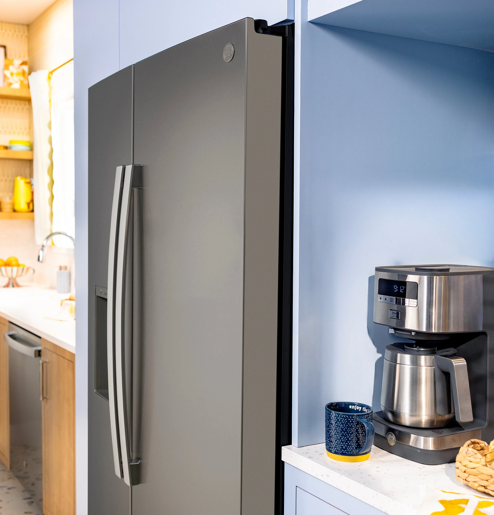23.6 Cu. Ft. Counter-Depth Side-By-Side Refrigerator with Extra Tall Dispenser and In-Door Icemaker GZS24NMYES