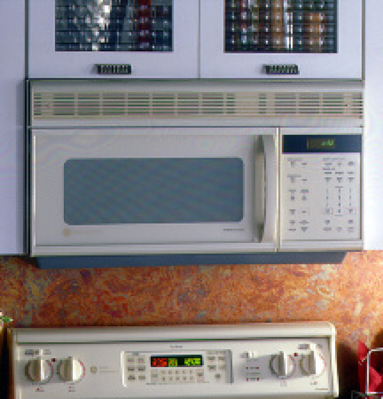 Spacemaker Oven with Convection / Microwave Cooking and Outside Venting JVM1190AY