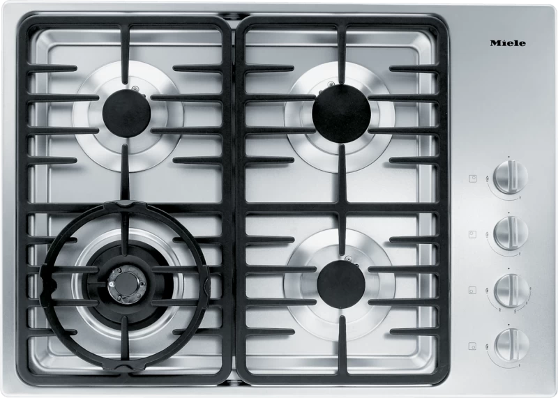 Gas cooktop with a dual wok burner for particularly wide ranging burner capacity. KM3465G