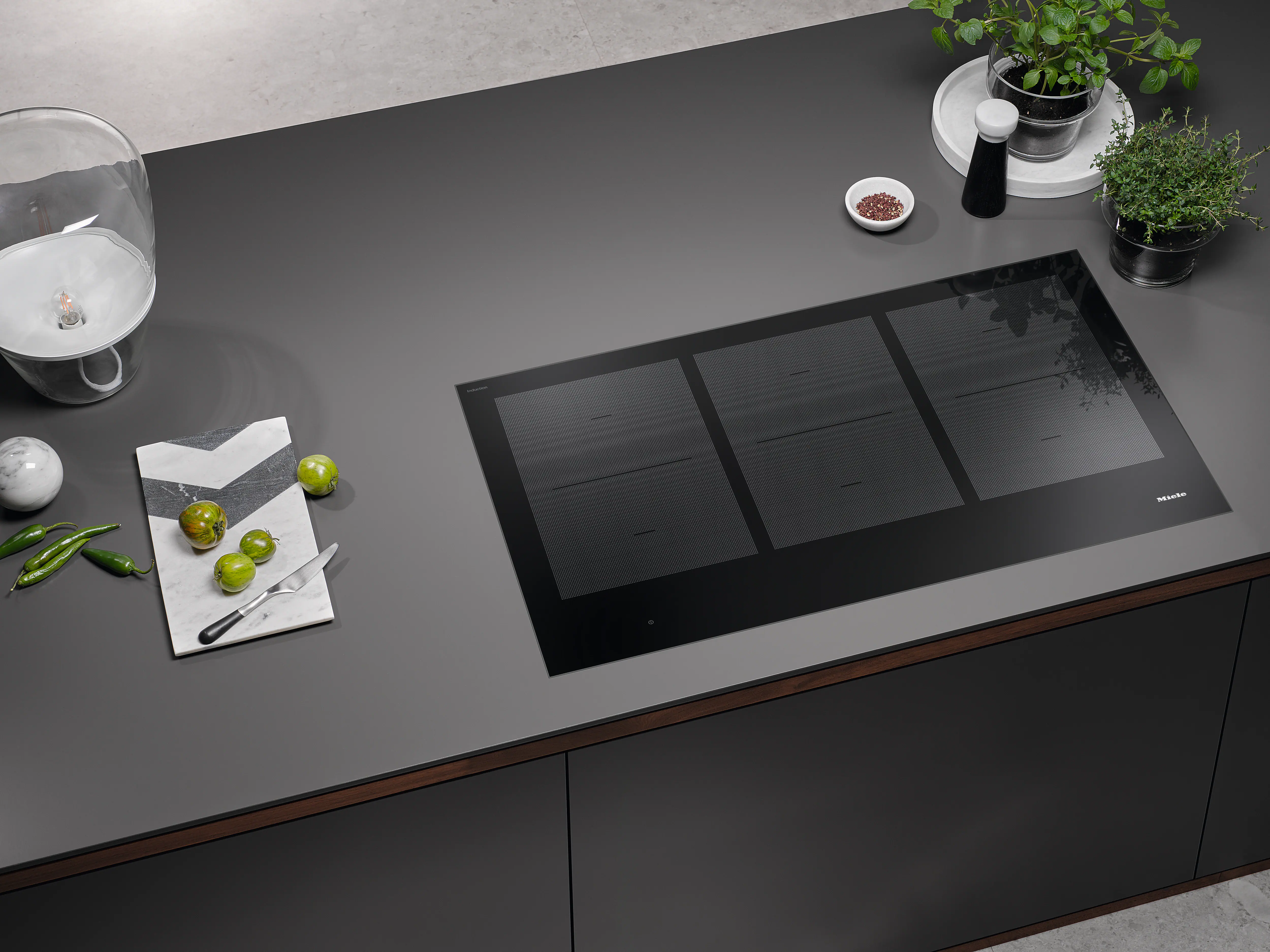 36-inch induction cooktop, operated with its own controls KM7745FL