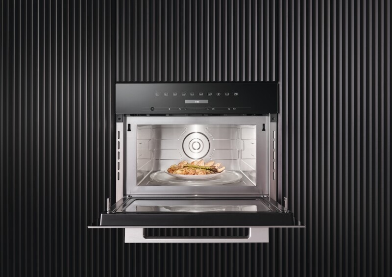 Built‑in microwave oven, 24" width  in a design that is the perfect complement with controls on the top. M7240TCAM