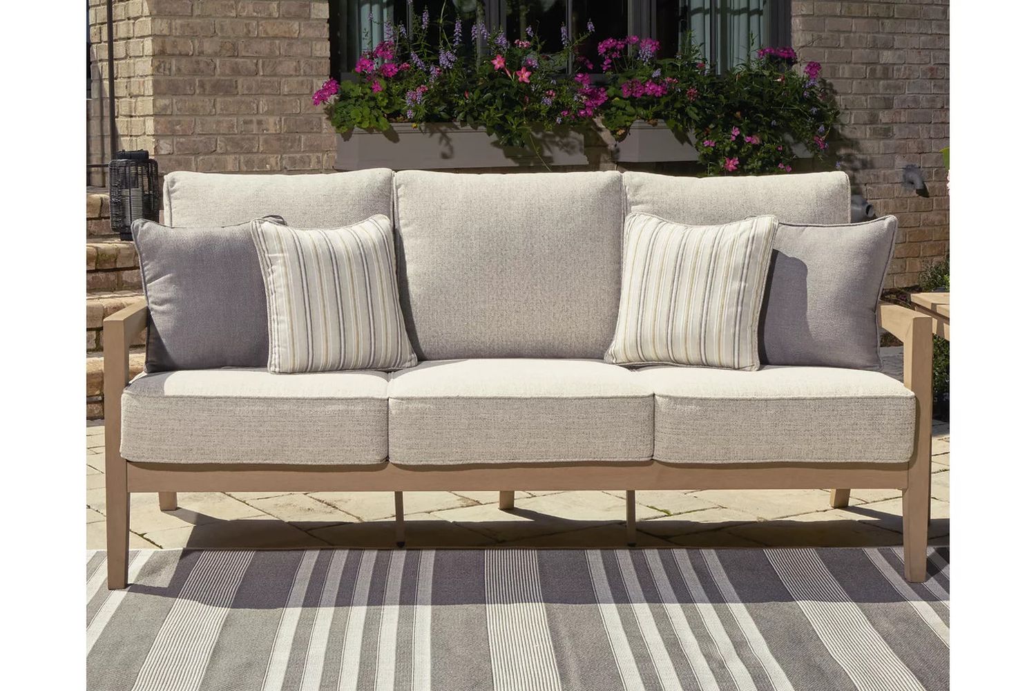 Hallow Creek Driftwood Outdoor Sofa With Cushion P560838