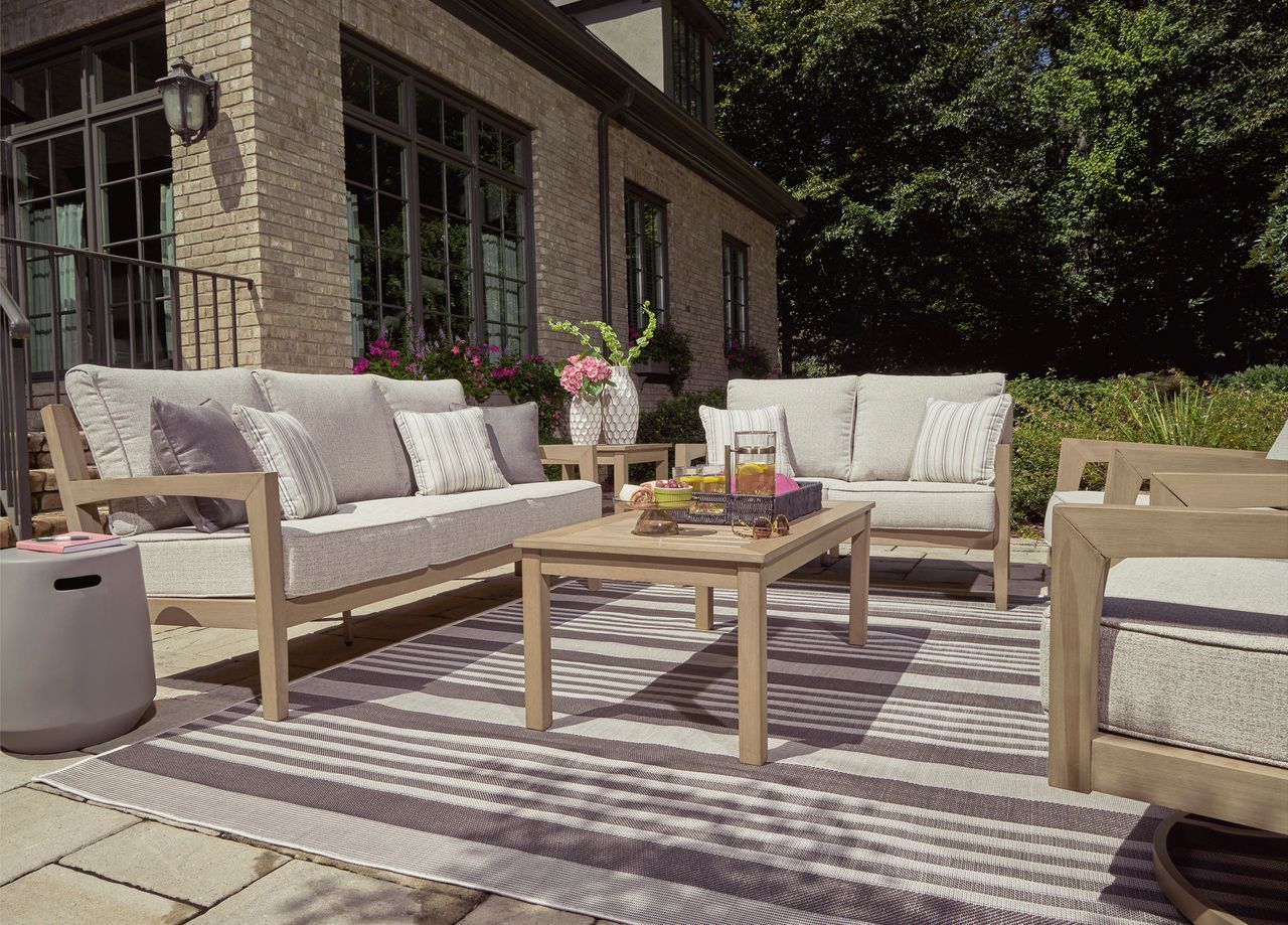 Hallow Creek Driftwood Outdoor Sofa With Cushion P560838