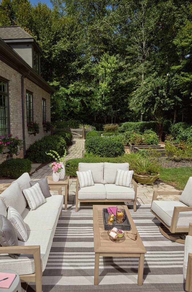 Hallow Creek Driftwood Outdoor Sofa With Cushion P560838