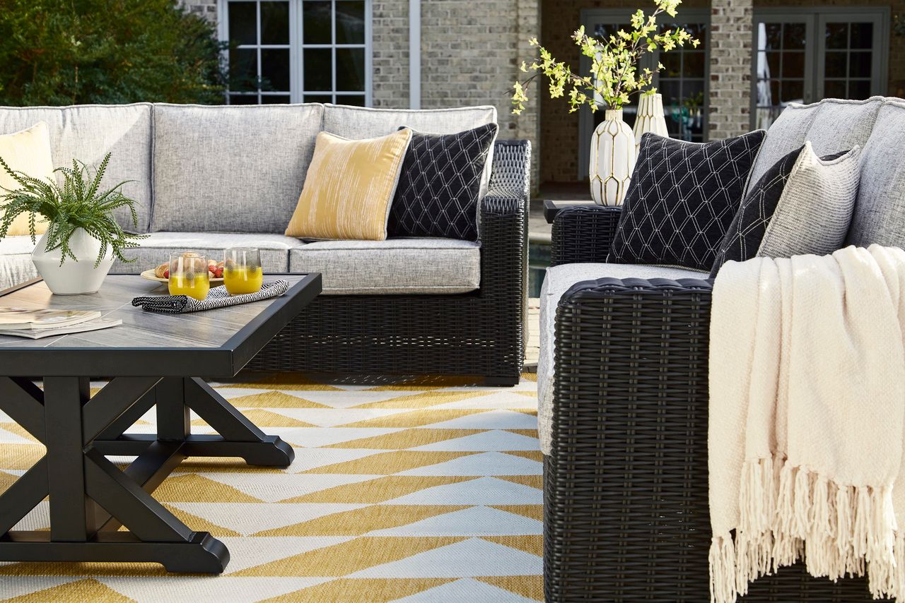 Beachcroft Outdoor Sofa with Cushion In Black/Light Gray P792838