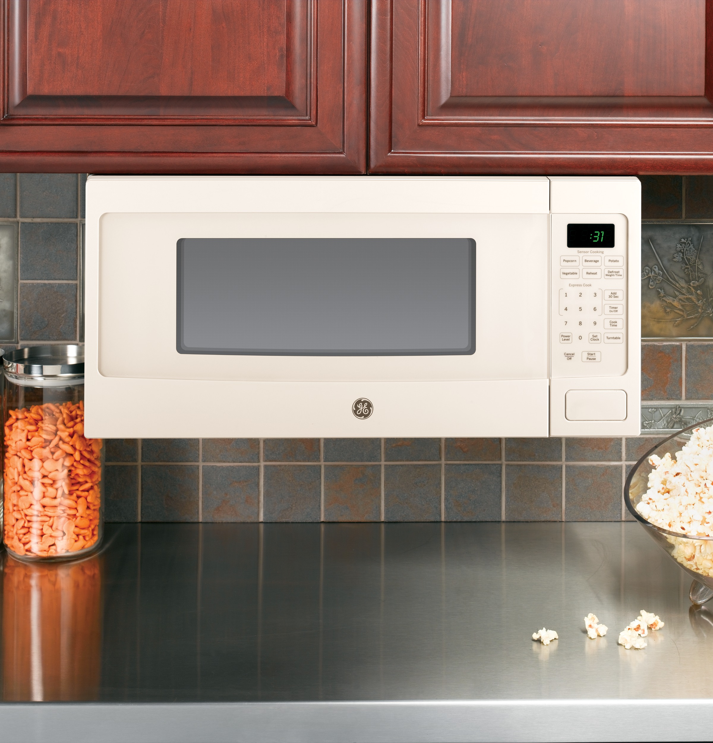 Series 1.1 Cu. Ft. Countertop Microwave Oven PEM31DFCC