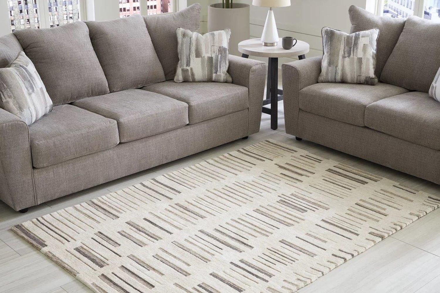 Leesdale 5 ft x 7 ft Rug In Ivory and Brown R406422