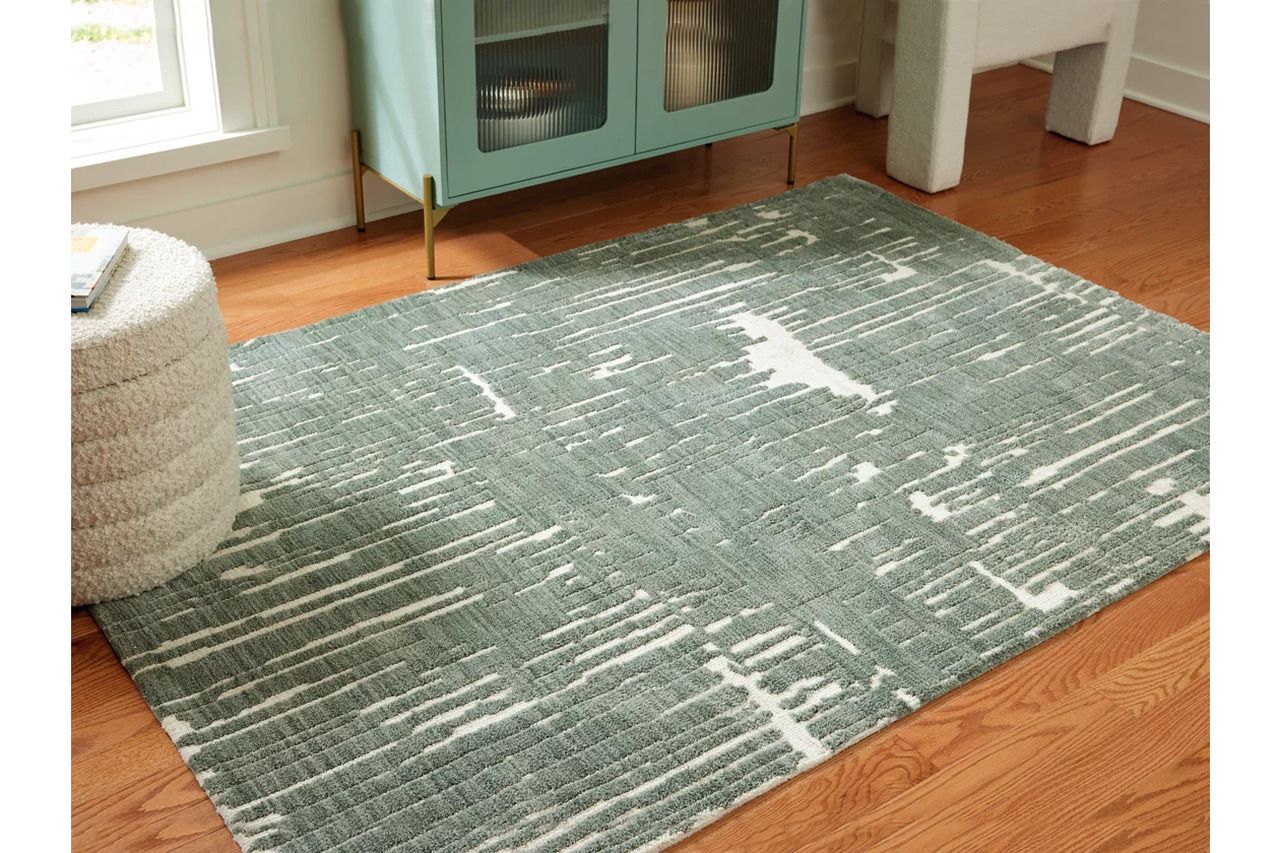 Cayworth 5' x 7' Rug In Teal and White R407092