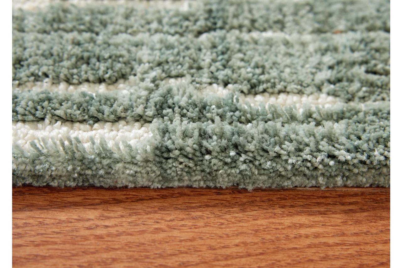 Cayworth 5' x 7' Rug In Teal and White R407092