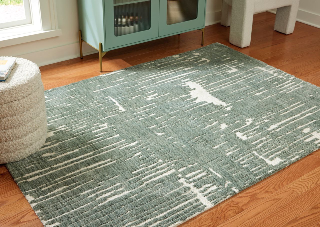 Cayworth 5' x 7' Rug In Teal and White R407092