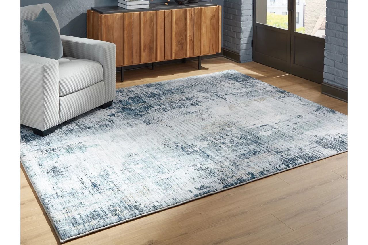 Arlenmont 7'6" x 9'6" Area Rug In Blue/White/Brown R407481