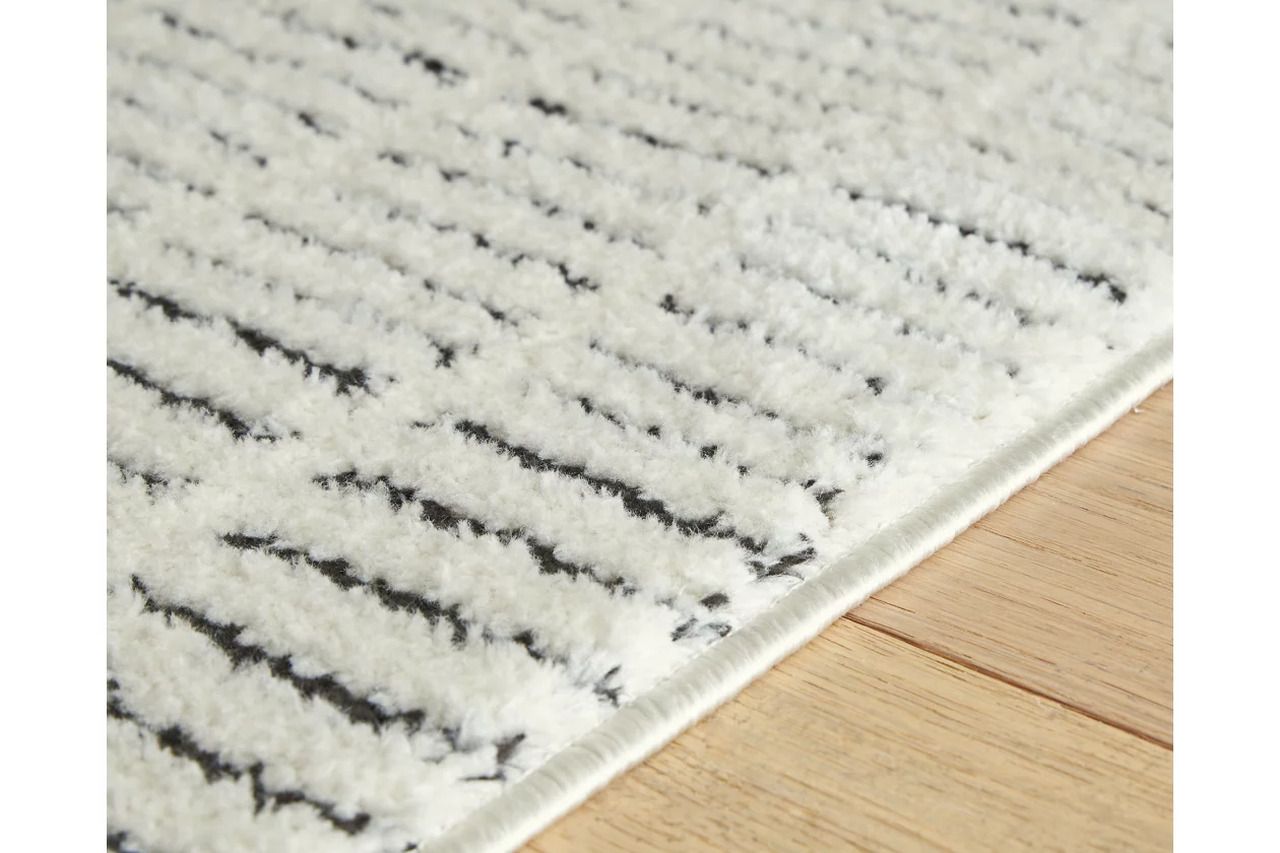 Turinwith 5'3" x 7' Area Rug In Ivory and Black R407552
