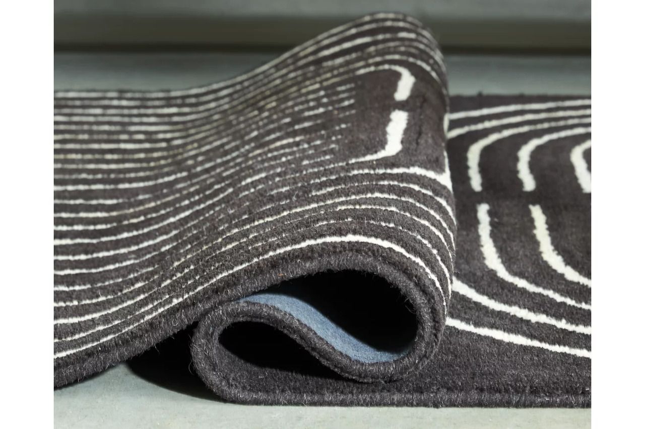Eldonmore 7'8" x 10' Area Rug In Black and Ivory R407571