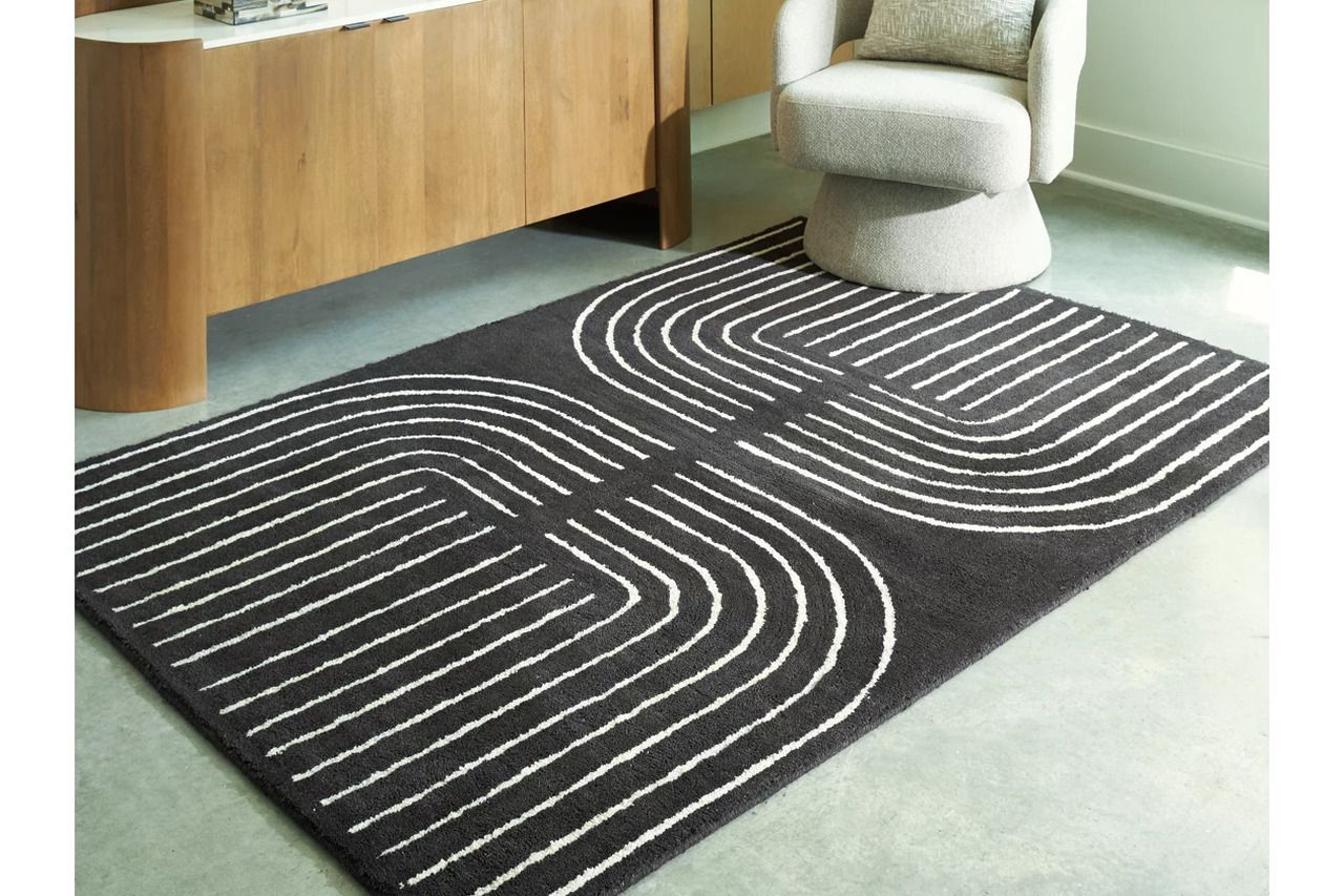 Eldonmore 5' x 7' Area Rug In Black and Ivory R407572