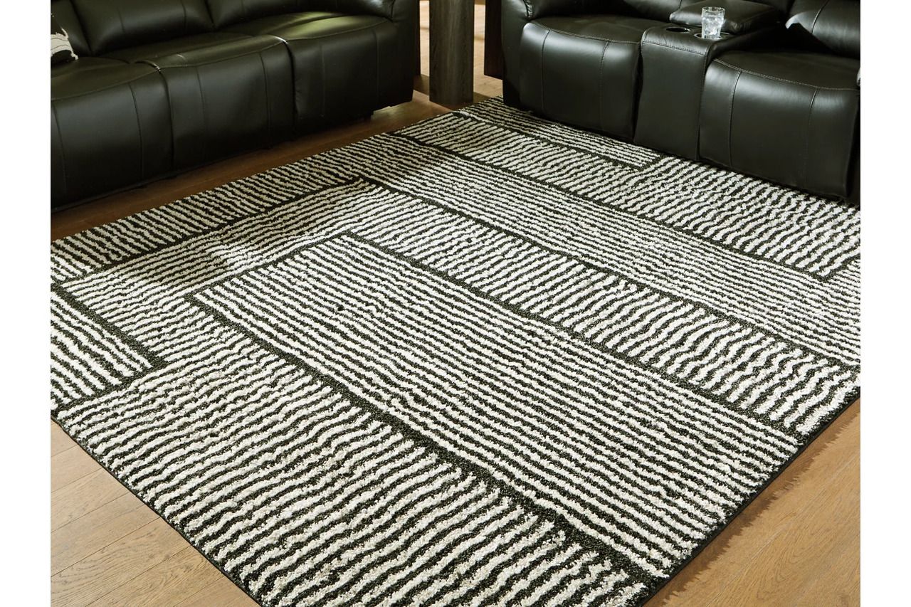 Kurtmen 7'10" x 9'10" Area Rug In Black and Ivory R407591