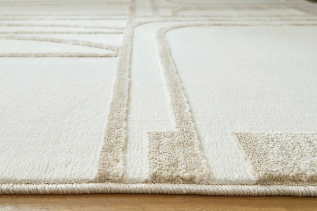 Farongrove 5'3" x 7' Area Rug In Ivory and Beige R407672