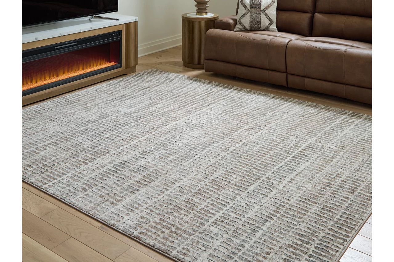 Fuadwick 7'10" x 10' Area Rug In Multi R407691