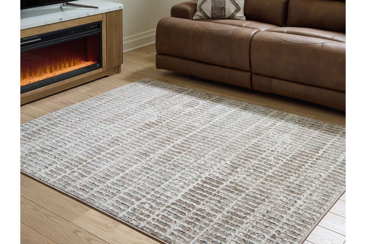 Fuadwick 5'3" x 7' Area Rug In Multi R407692
