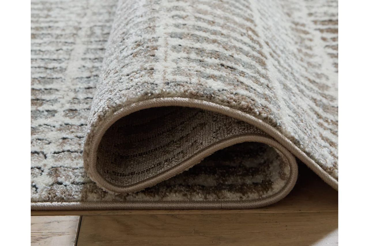 Fuadwick 5'3" x 7' Area Rug In Multi R407692