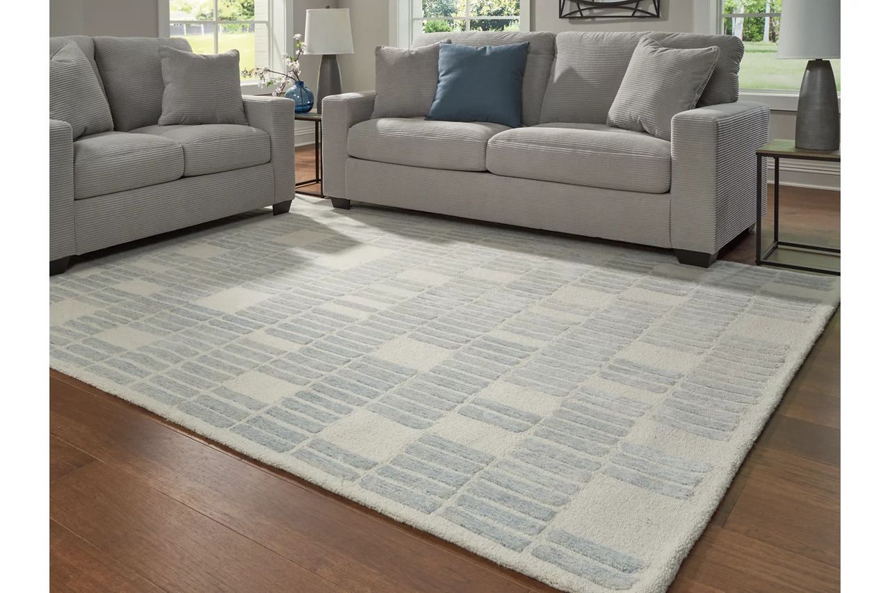 Dylanton 7'8" x 10' Area Rug In Ivory and Blue R407811