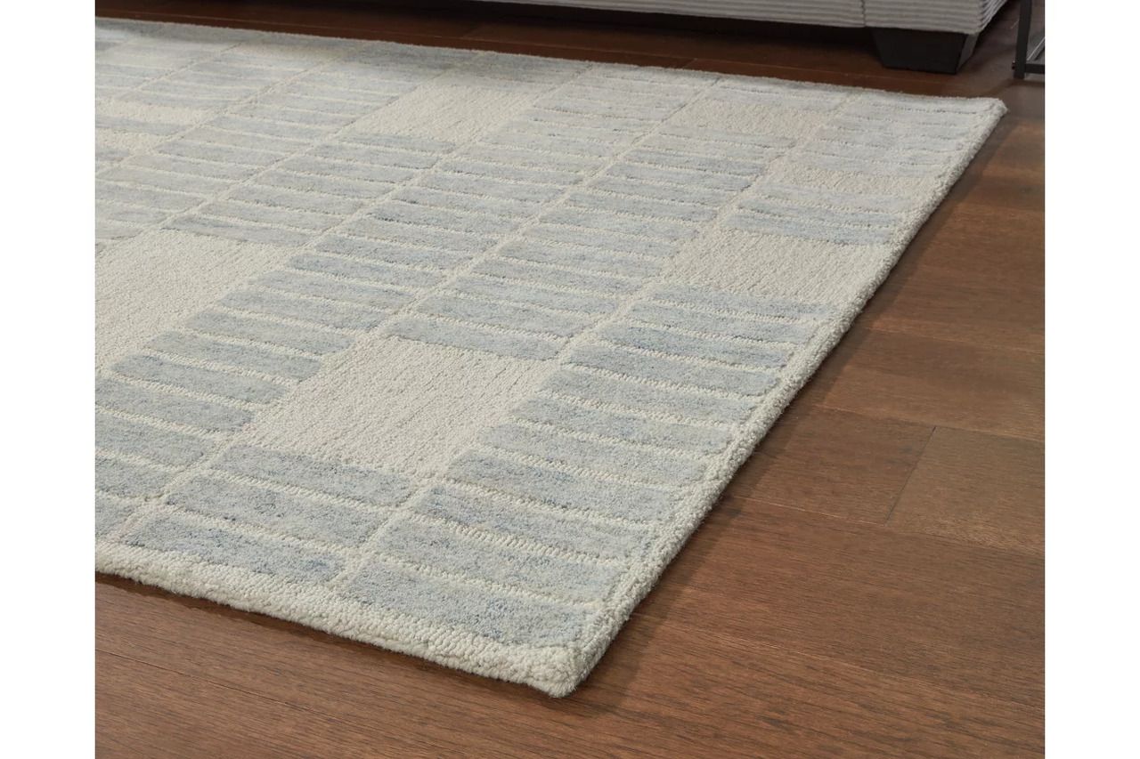 Dylanton 7'8" x 10' Area Rug In Ivory and Blue R407811