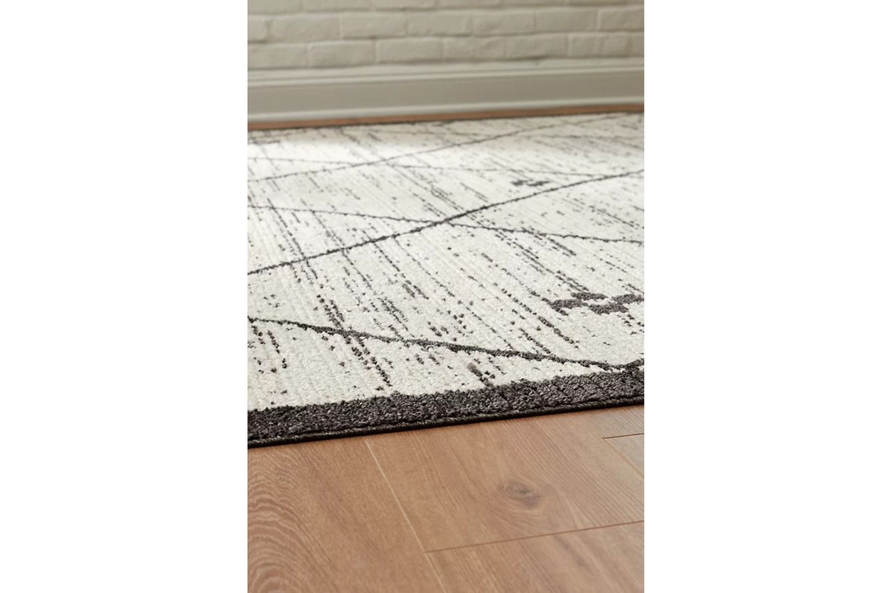 Fenriston Medium Rug In Cream and Black R408302